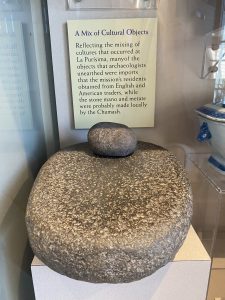 old grinding stones in a museum in California
